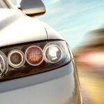 rear side view of a sport car in blurred motion